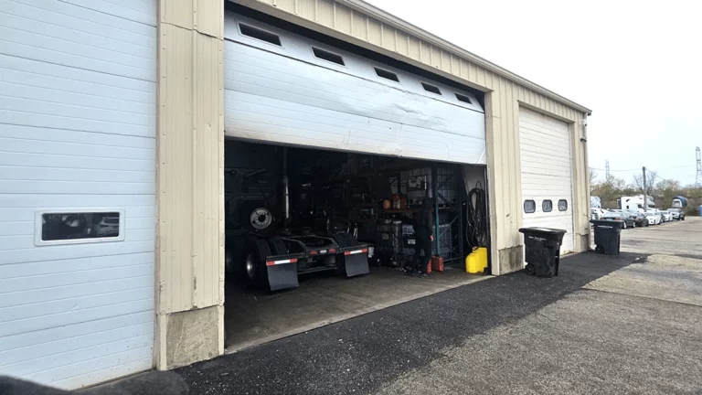 There was an impact from a truck track into a garage door. It is necessary to replace the garage door sections so the garage door works properly.