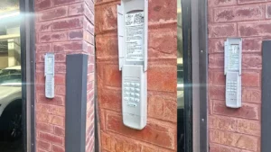 Three different keypads: one LiftMaster keypad and two Chamberlain keypads.