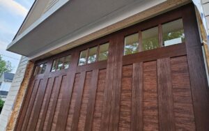 A new Canyon Ridge garage door, size 16x8, manufactured by Clopay, was professionally installed by our company.