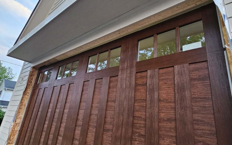 A new Canyon Ridge garage door, size 16x8, manufactured by Clopay, was professionally installed by our company.