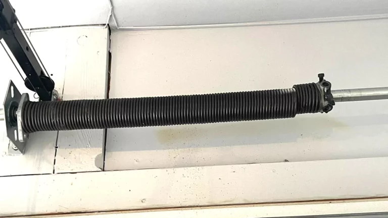 A broken garage door spring that needs replacement in the Wheeling, IL area