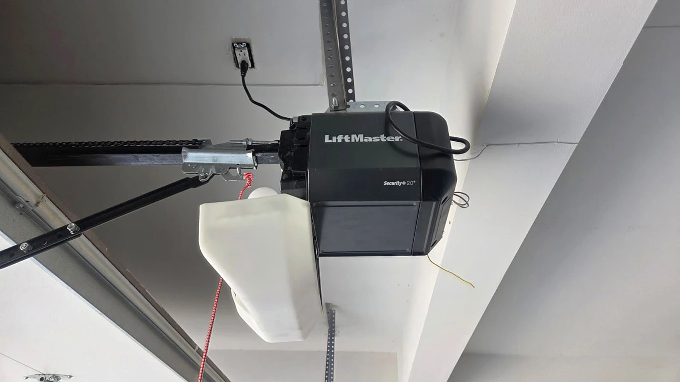 A new garage door opener is being installed in Wheeling, Illinois.