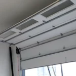 New white C.H.I. garage door in the open position, featuring durable construction, smooth operation, and a clean modern design.